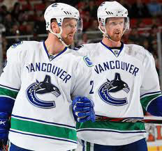 Canucks take charge with 3-2 victory over defending Cup champs