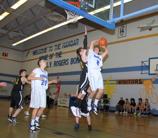 Bombers walk all over Wildcats in Thursday night hoop action at the Hangar