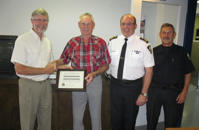 Nelson Police board honours two local volunteers