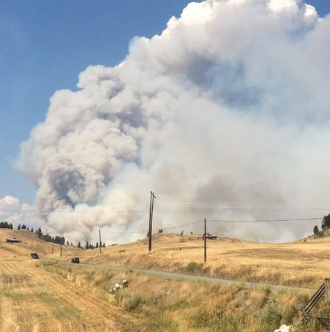 Smoke from USA fills valley, West of Rock Creek burns out of control
