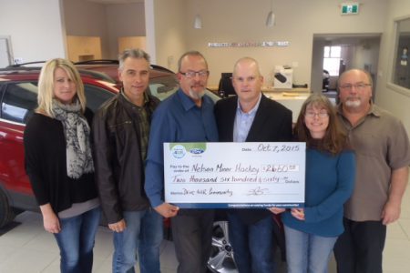 NMHA drives away with donation from Nelson Ford during Drive 4UR Community fundraiser