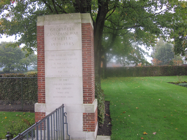Former Nelsonite views graves of three local soldiers at Groesbeek Canadian War Cemetery