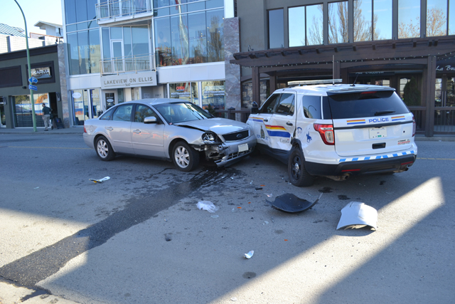 Kelowna RCMP picking up pieces after alleged assault suspect crashes into police cruiser