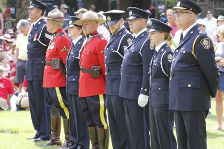 Members of the Nelson Police Department and RCMP formed the Colour Guard.