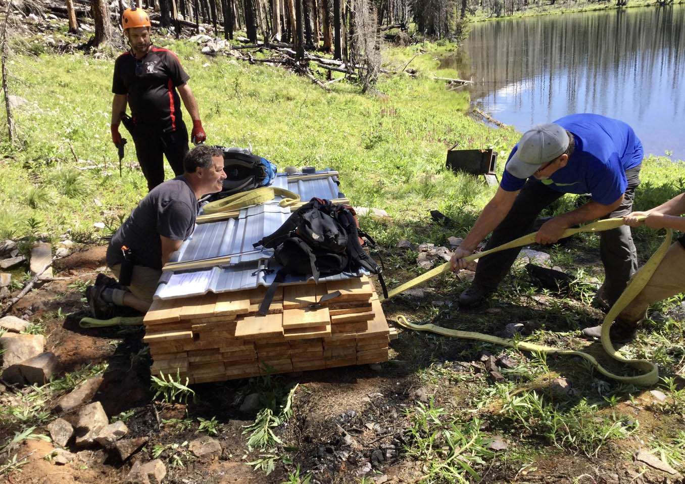 Harrop-Procter Community Co-operative volunteers work to restore Mill Lake trail